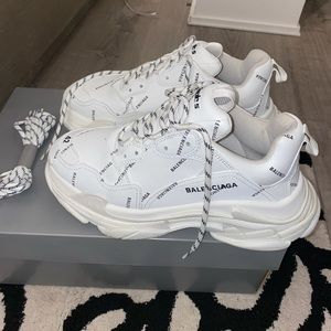 Balenciaga All over logo Triple S sneakers.
